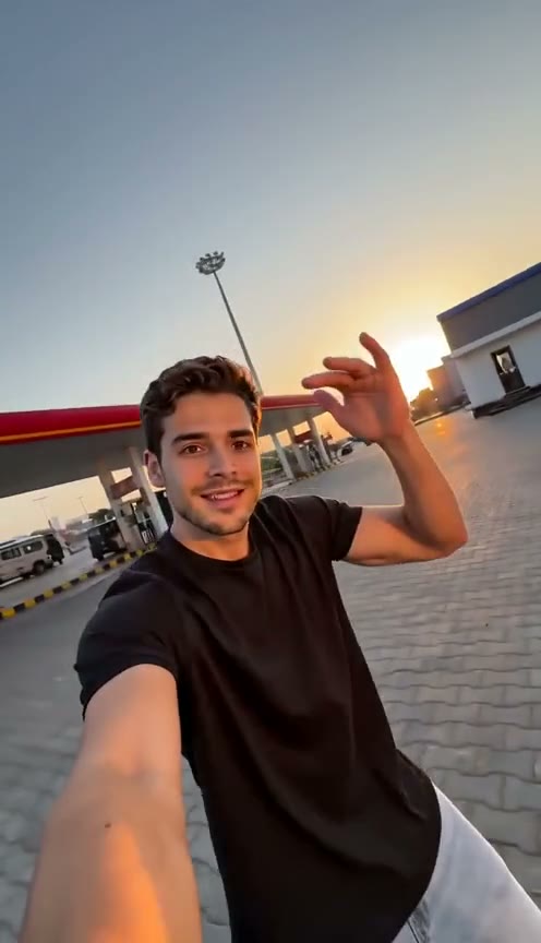 Selfie close-up shot from a gas station dance AI video
